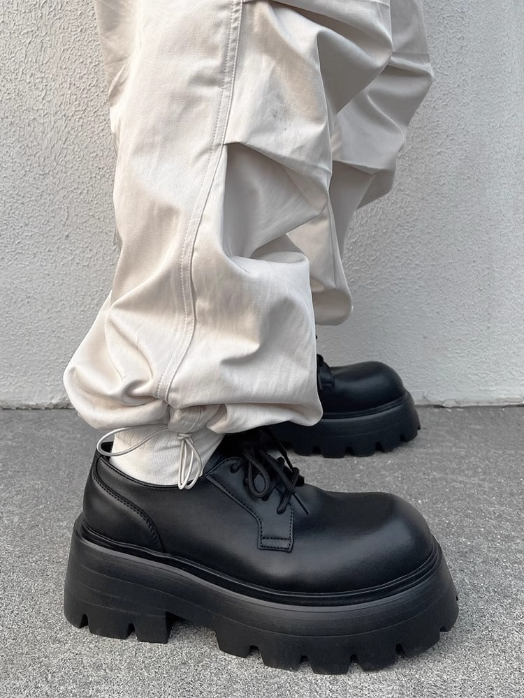 Thick-soled big-toed leather shoes