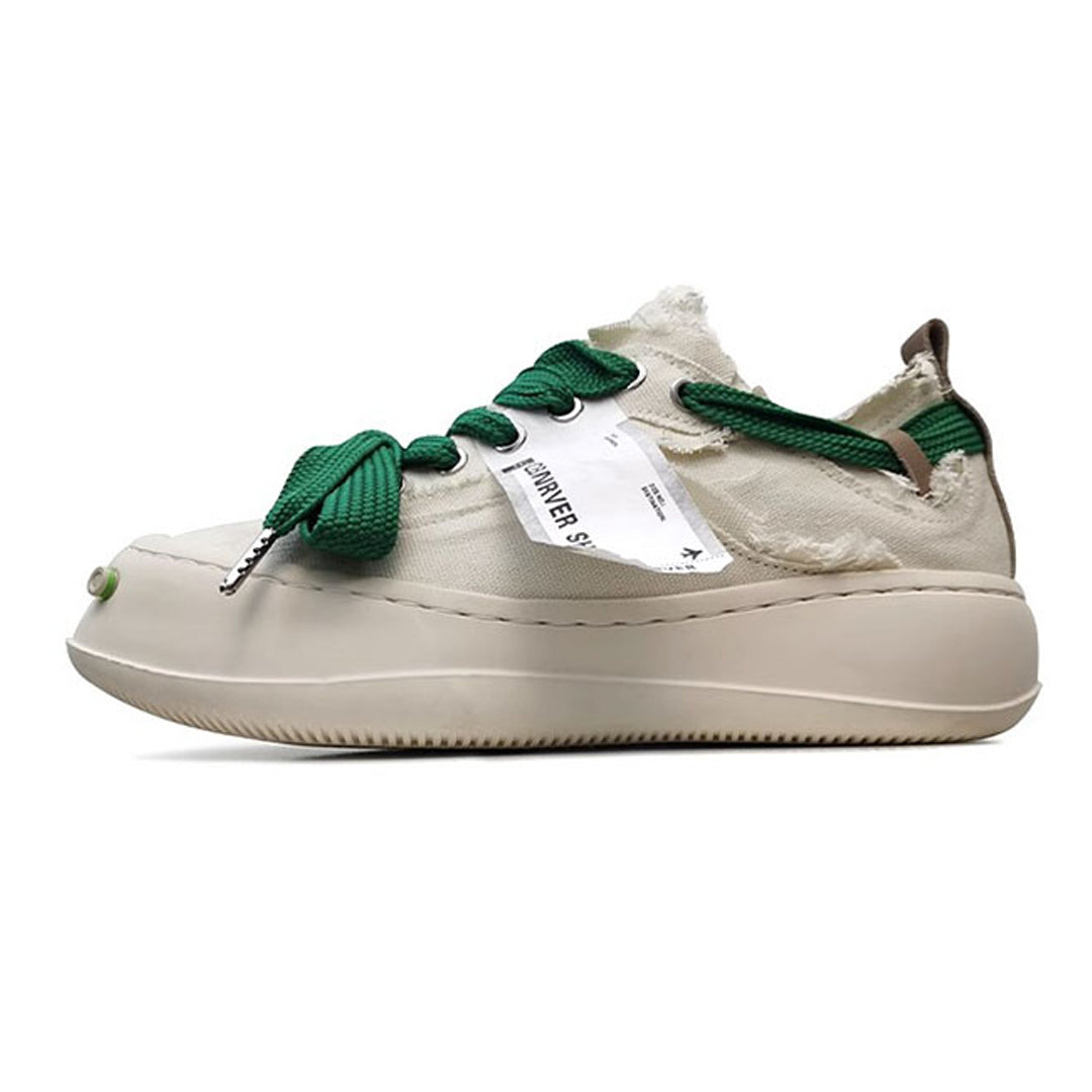 Thick-soled sneakers with raw edges