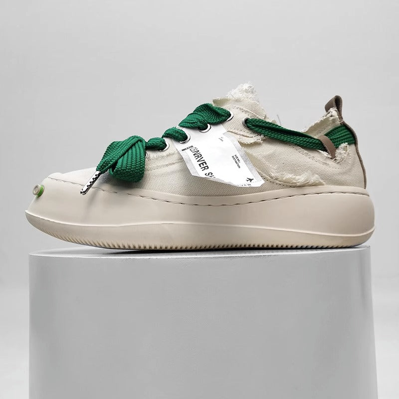 Thick-soled sneakers with raw edges