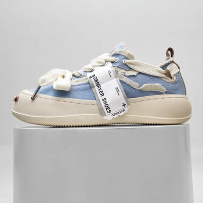 Thick-soled sneakers with raw edges